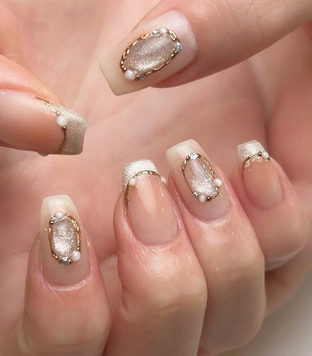 Hand wearing Moonlight Elegance coffin-shaped press-on nails
