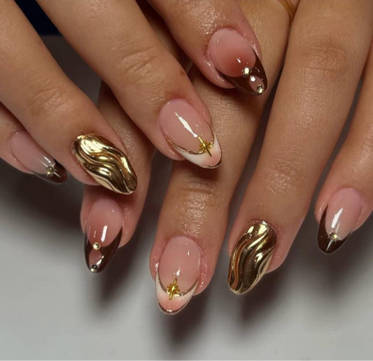 Hand wearing gold Almond -shaped press-on nails